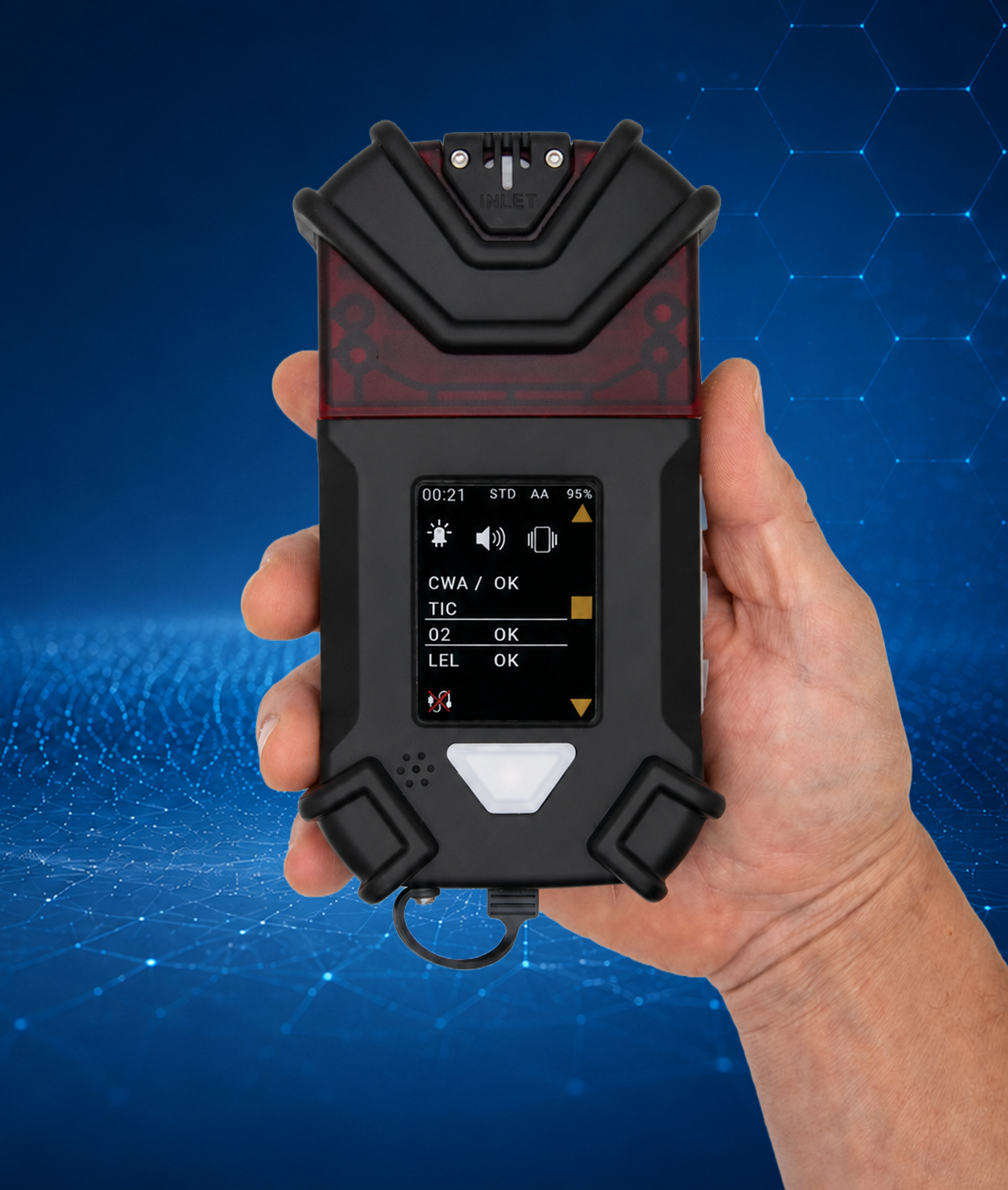 ChemBadge MX handheld detector held in hand, shown at true scale
